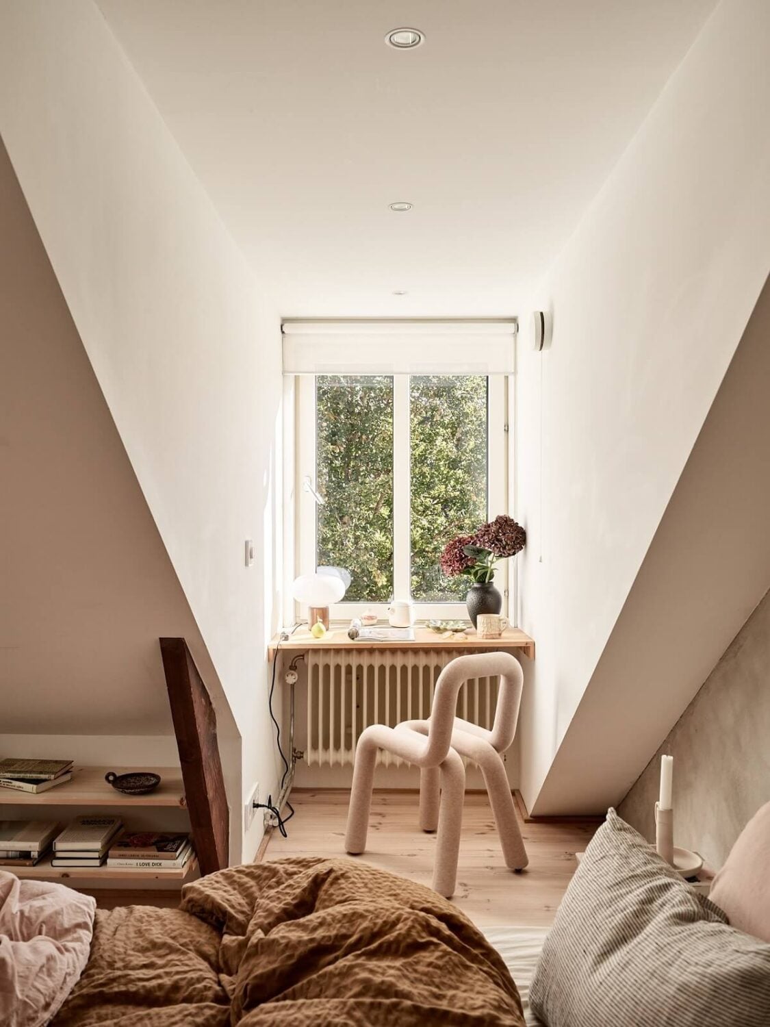 A Light Two-Bedroom Attic Apartment in Sweden 12 desk in dormer window
