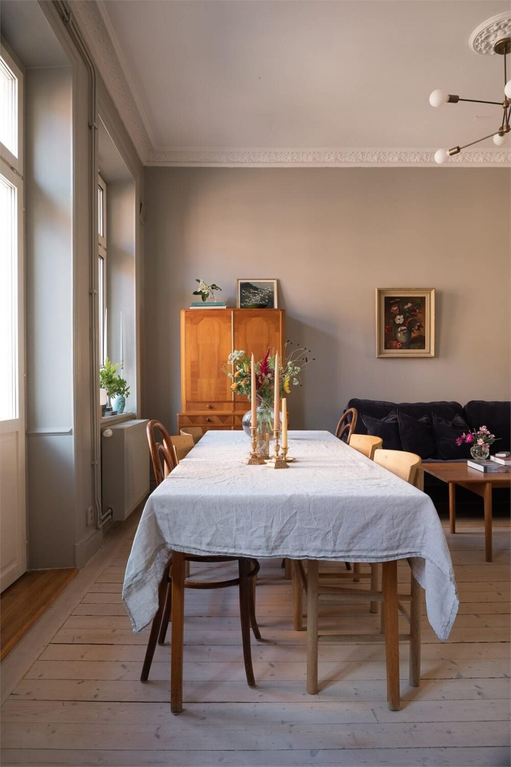 A Turn-of-the-Century Apartment with a Dark Blue Bedroom - Revisited 7 dining table in light gray living room