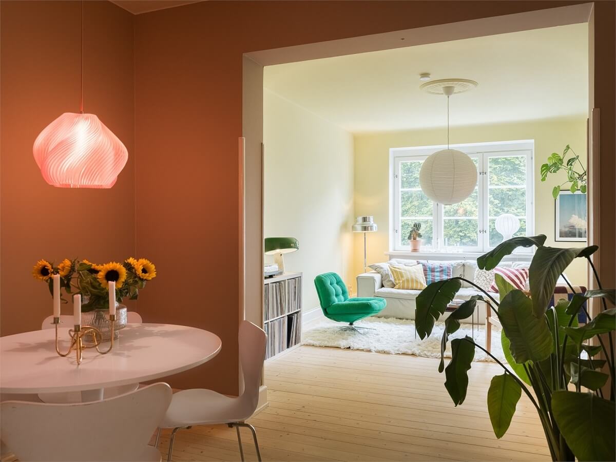 Colorful and Light Rooms in a Swedish One-Bedroom Apartment 6 double living room in pink and yellow