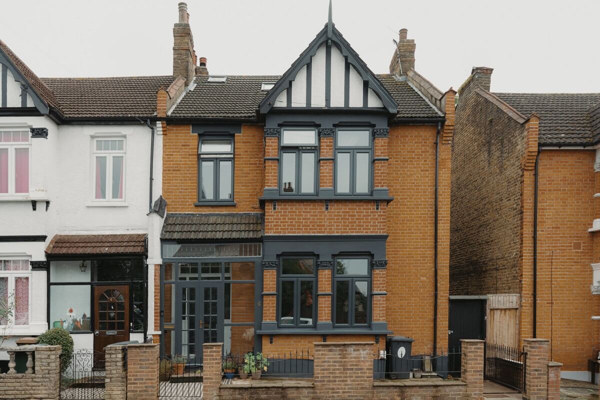 Original Details and a Modern Extension in a London House 34 exterior dark gray painted woodwork