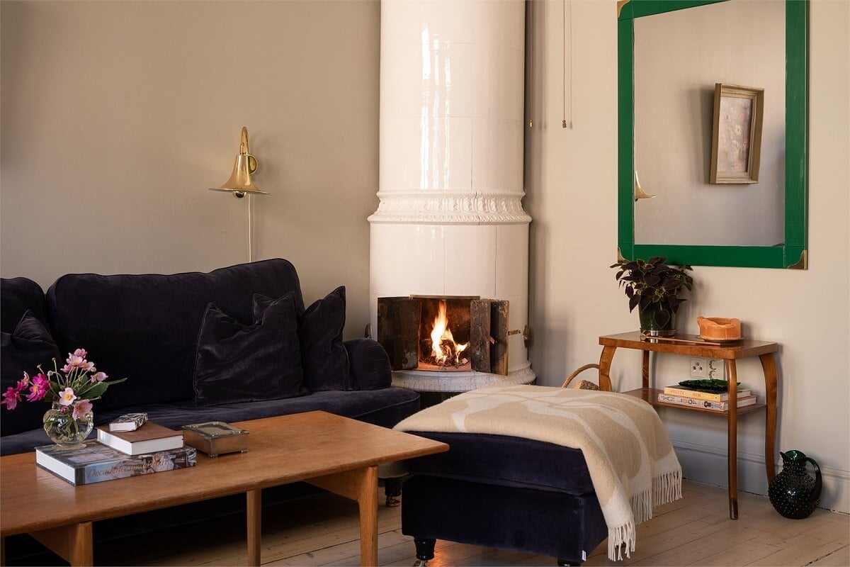 A Turn-of-the-Century Apartment with a Dark Blue Bedroom - Revisited 2 fireplace velvet sofa