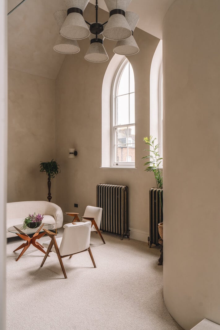 Contemporary Interiors with Limewash Walls in an Old School Building 10 gothic windows in large bedroom with sitting room nordroom