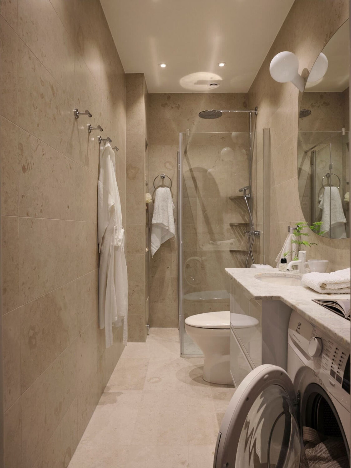 A Light Pastel Yellow and Pink Apartment in Stockholm 25 gray bathroom walk in hower