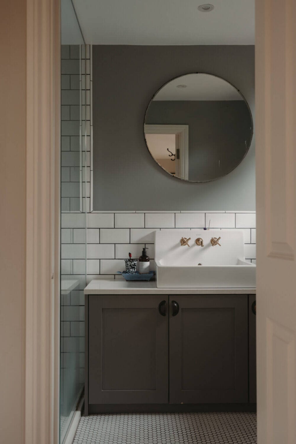 Original Details and a Modern Extension in a London House 31 gray bathroom with white tiles