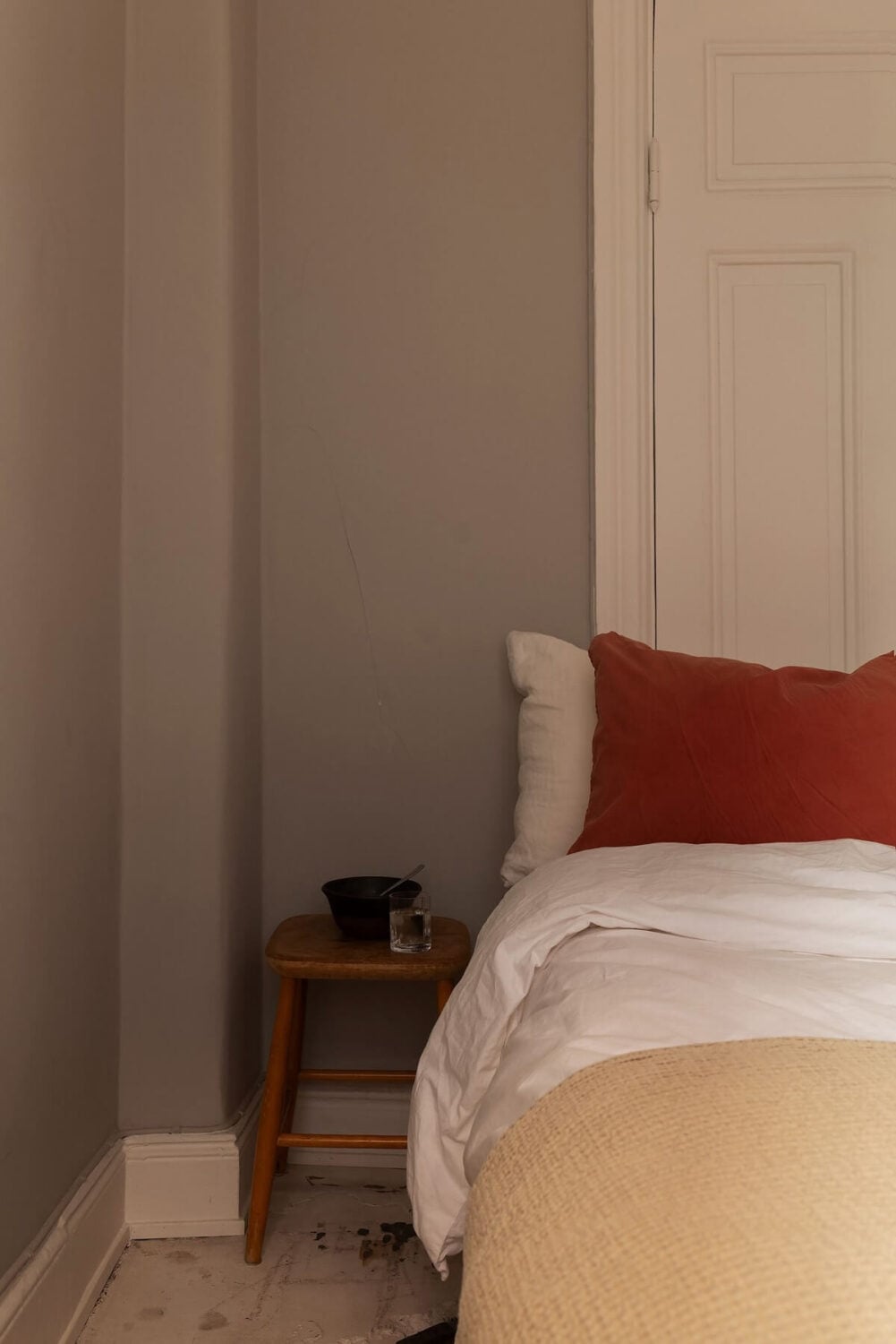 Sober Colors in a Small Renovated Stockholm Apartment 17 gray bedroom