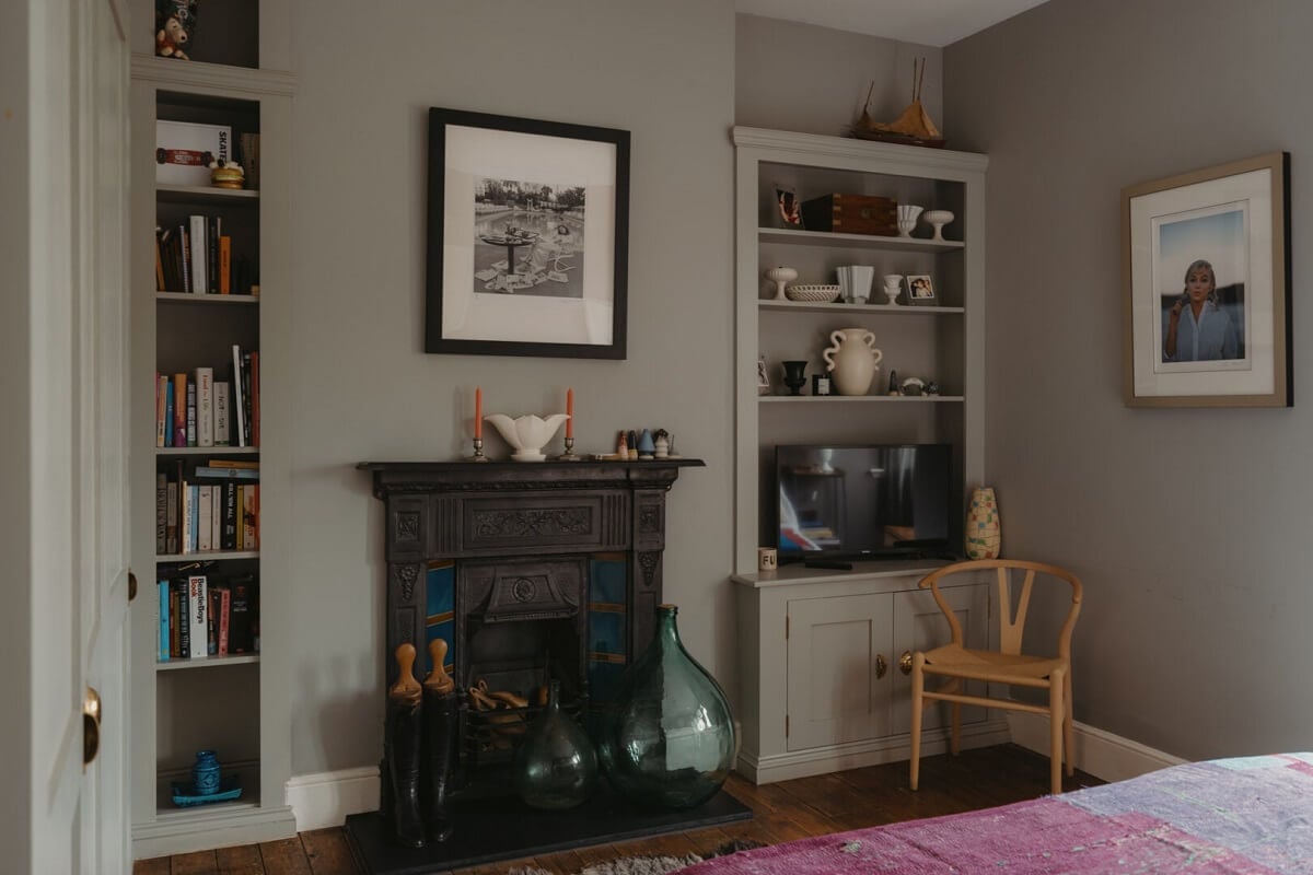 Original Details and a Modern Extension in a London House 18 gray bedroom fireplace bookshelves