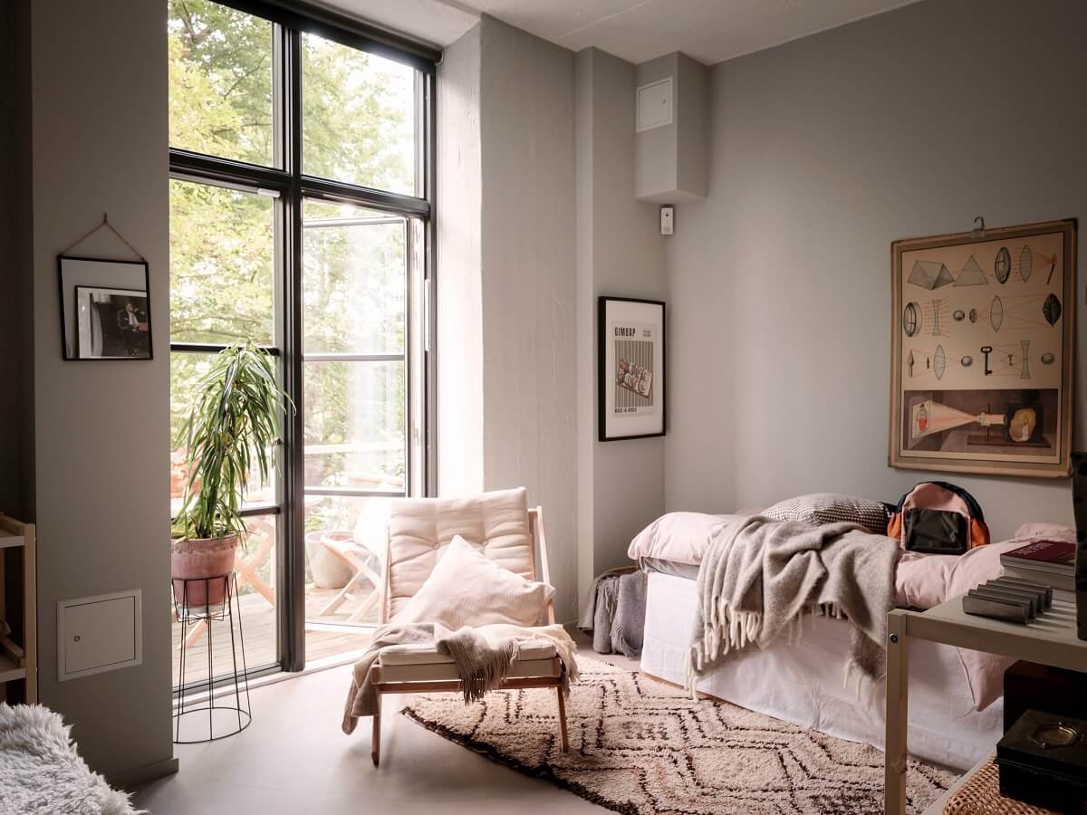 A Modern Industrial Basement Apartment in Sweden 18 gray bedroom steel windows