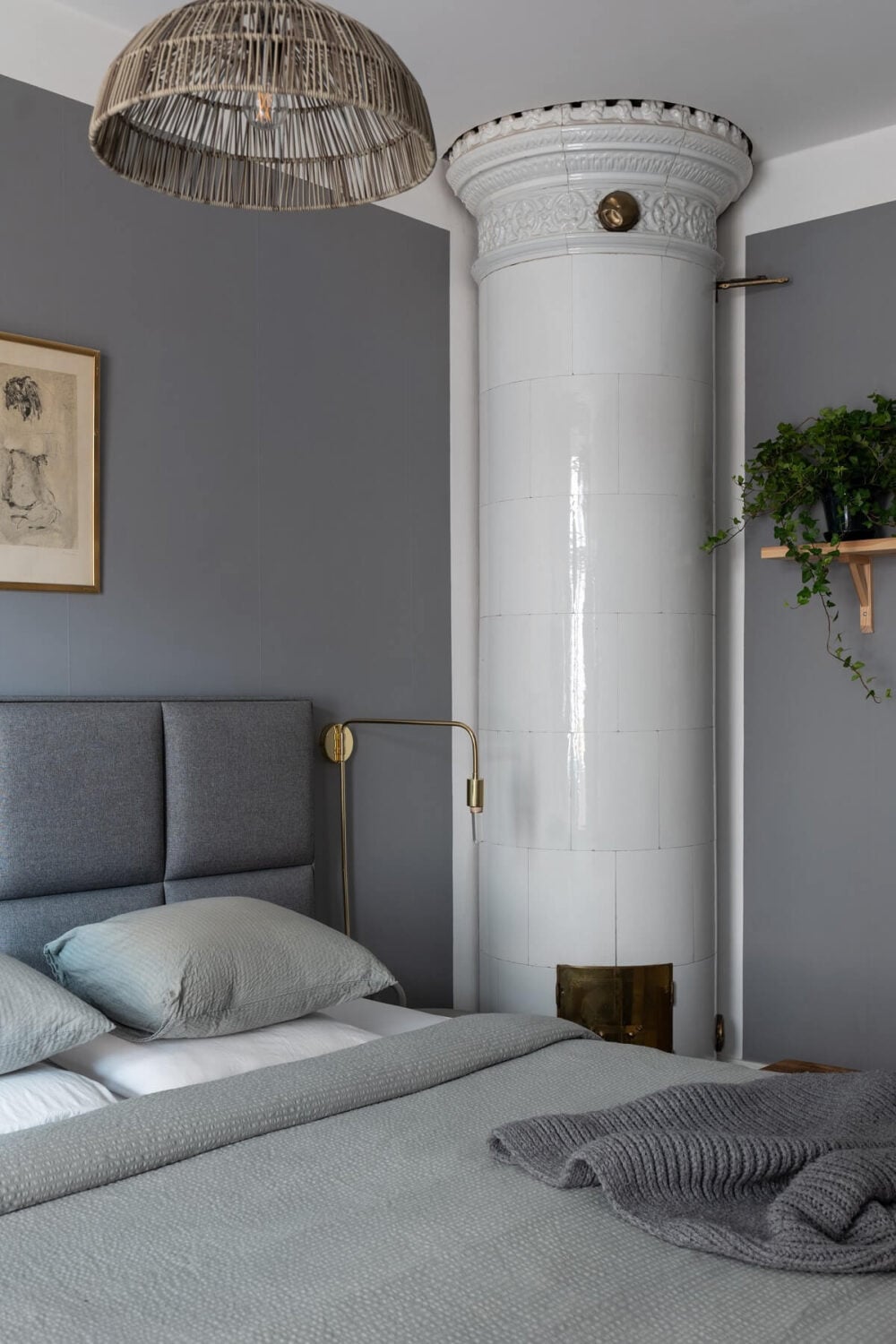 Colorful Art and Furniture in a Stylish Scandi Apartment 21 gray bedroom with fireplace
