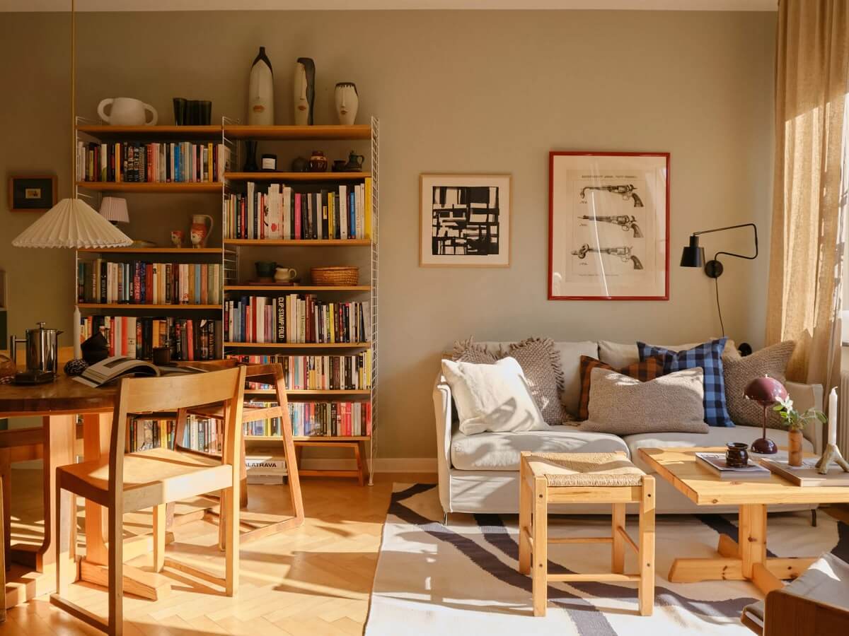 gray scandi living room wooden furniture bookshelves