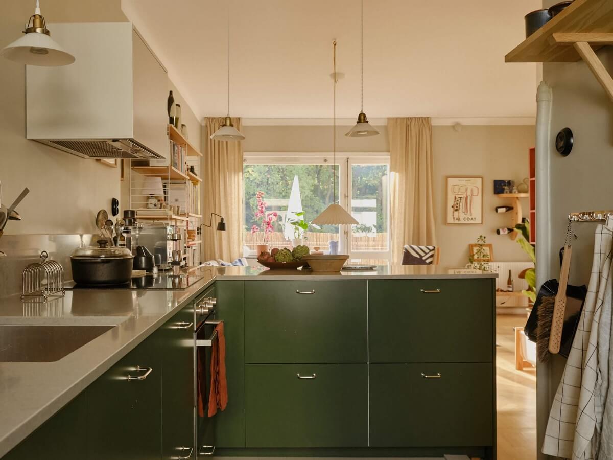 A Beautiful Calm and Natural Apartment with a Green Kitchen 10 green kitchen open plan living space