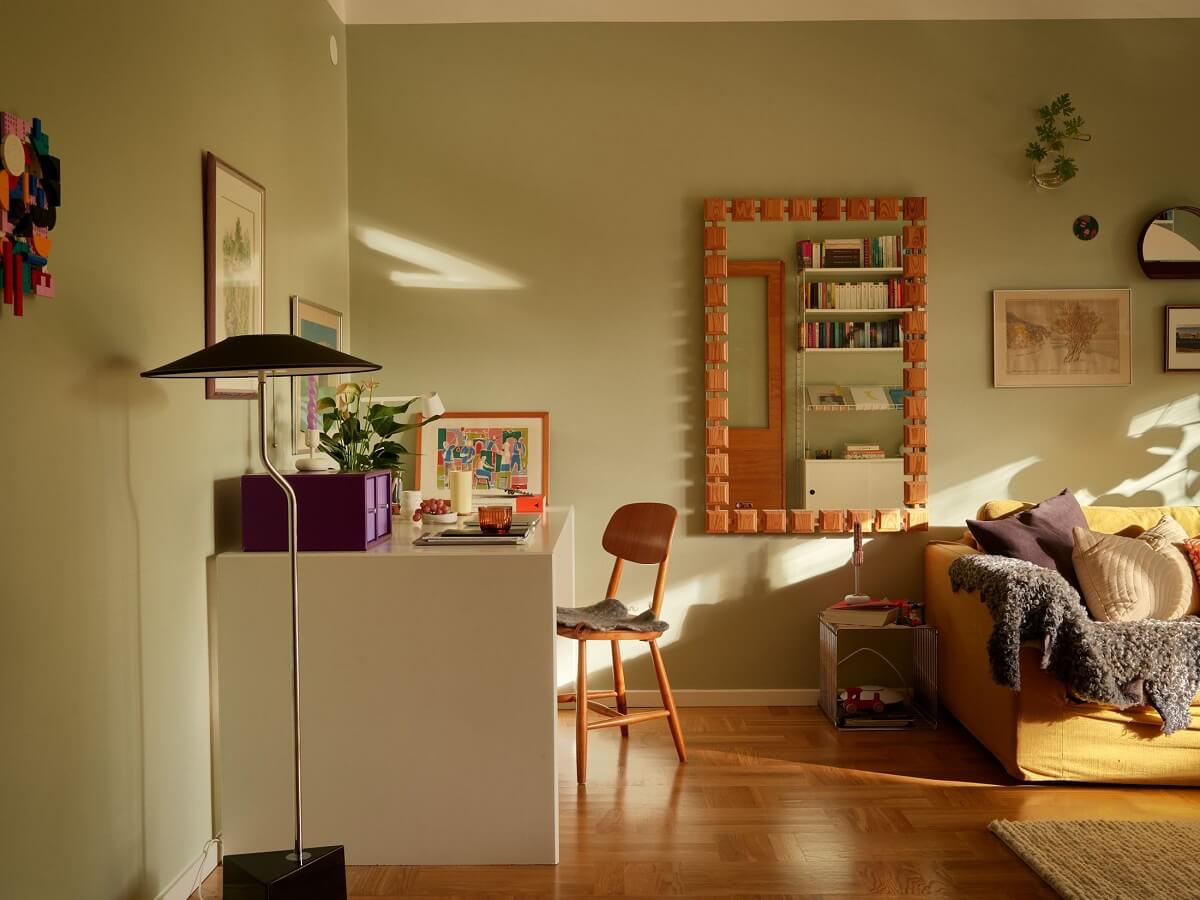 Preserved Midcentury Details and a Red Bedroom in a Stockholm Apartment 4 green living room with desk