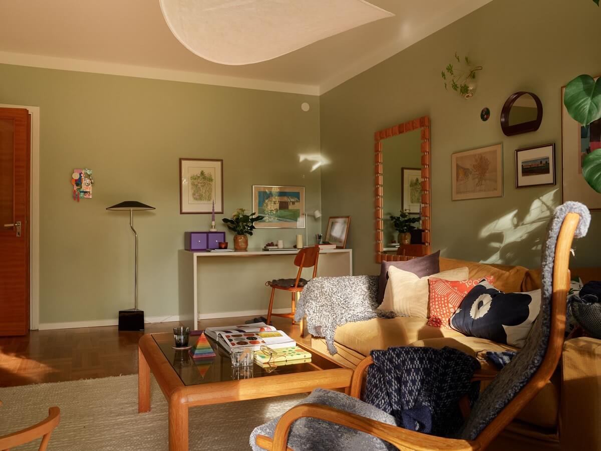 Preserved Midcentury Details and a Red Bedroom in a Stockholm Apartment 3 green scandinavian living room