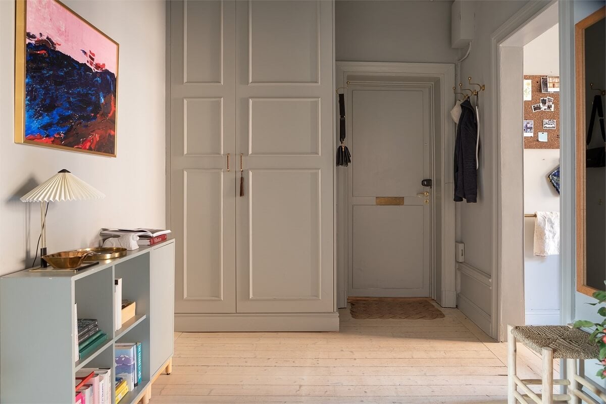 A Turn-of-the-Century Apartment with a Dark Blue Bedroom - Revisited 26 hallway gray wardrobes