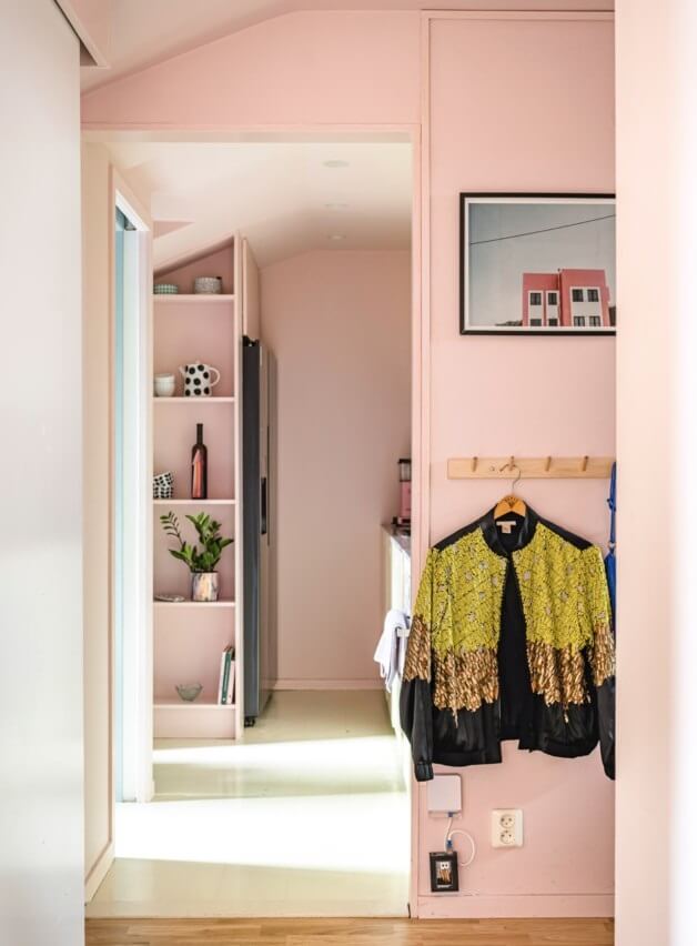 A Small, Colorful Attic Apartment with A Yellow Kitchen 25 hallway with open storage