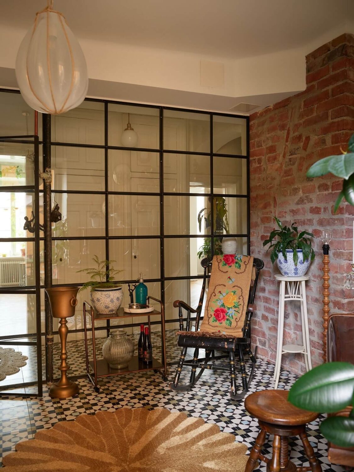 Beautiful Historic Details in a Large and Inviting Family Apartment 20 industrial glass wall and exposed brick