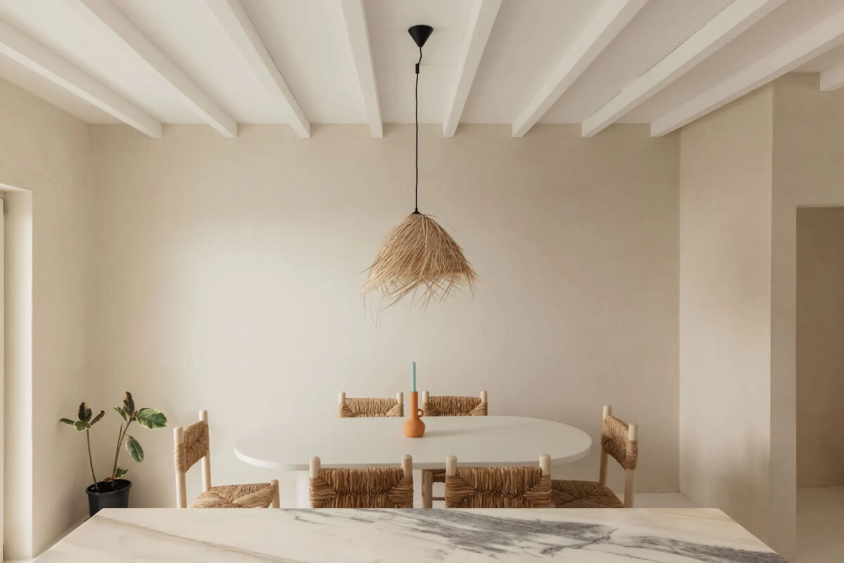 A Serene Minimalistic Townhouse in Portugal 10 kitchen dining table