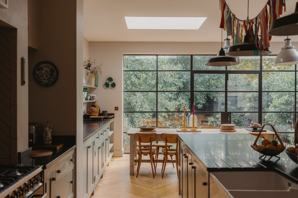 Original Details and a Modern Extension in a London House 6 kitchen large table floor to ceiling windows