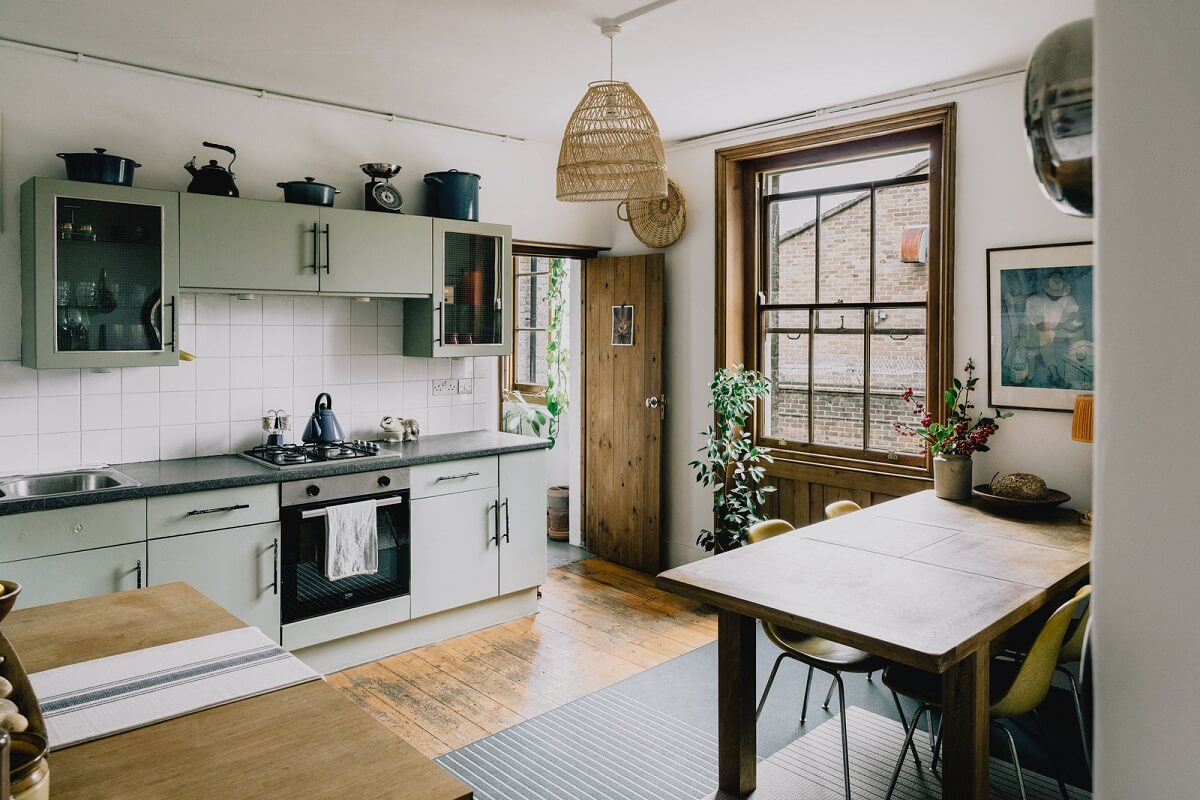 Period Details in a Cozy London Apartment in a Victorian Tenement Building 5 kitchen with dining table