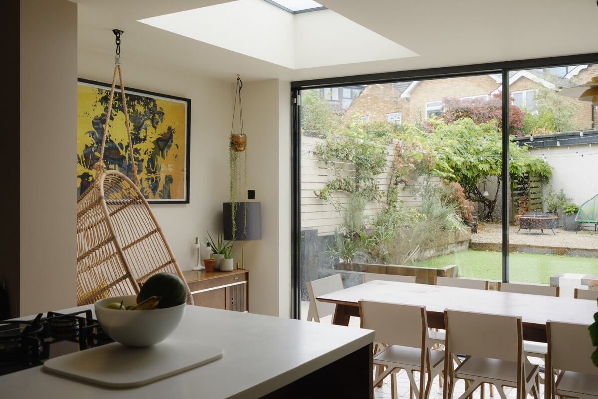 Nature-Inspired Colors in an Extended East London Home 7 kitchen with extended dining space with skylight