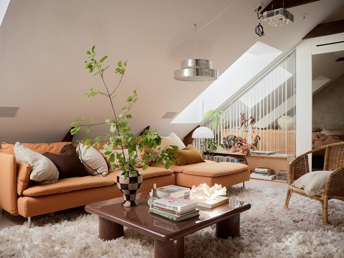 A Light Two-Bedroom Attic Apartment in Sweden 1 large rug nordic living room