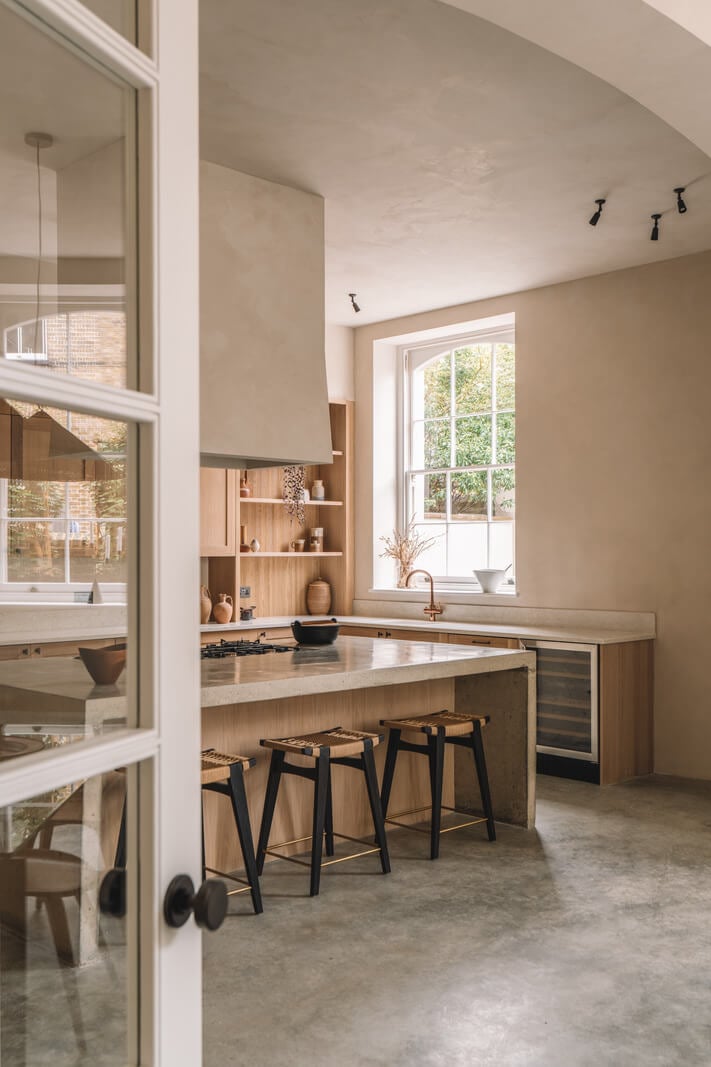Contemporary Interiors with Limewash Walls in an Old School Building 2 large wooden kitchen with island and high ceilings nordroom