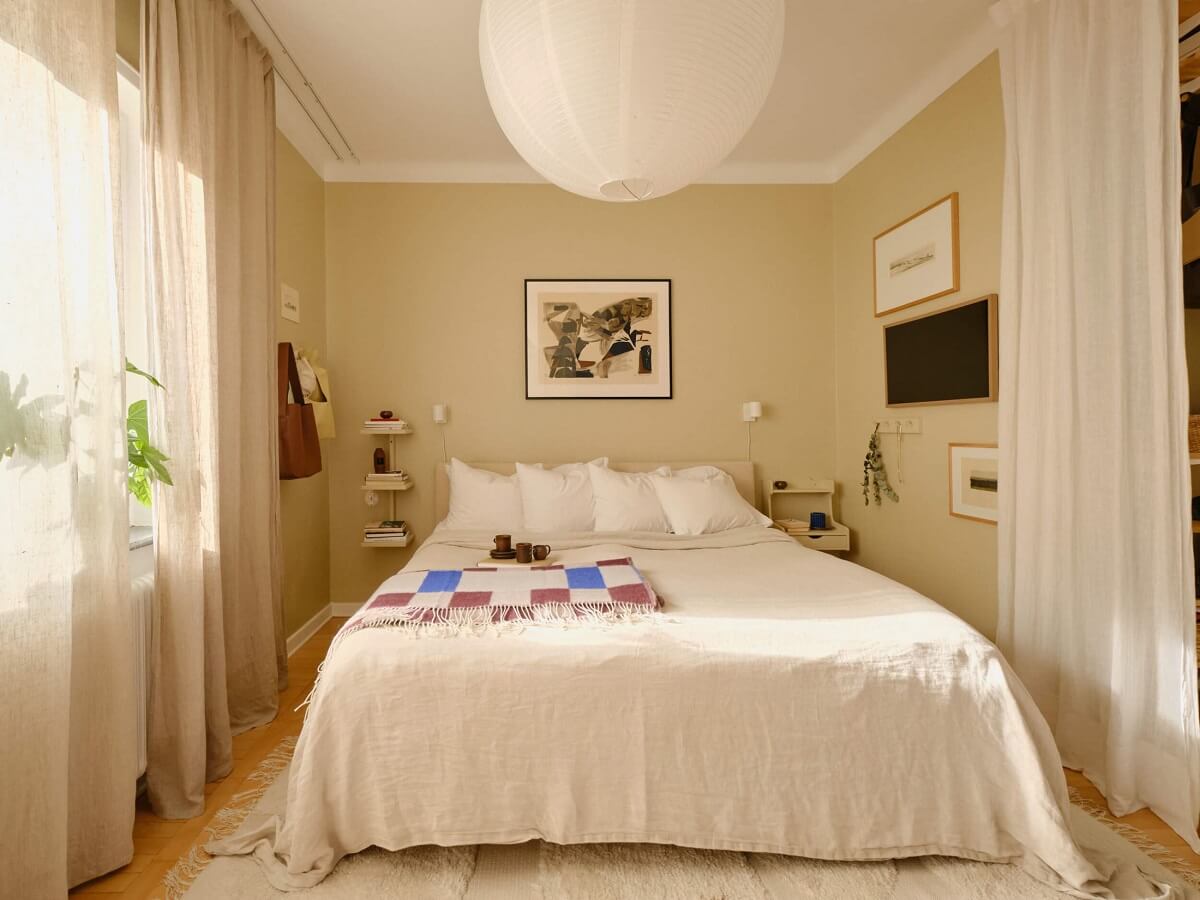 A Beautiful Calm and Natural Apartment with a Green Kitchen 16 light beige bedroom white curtains