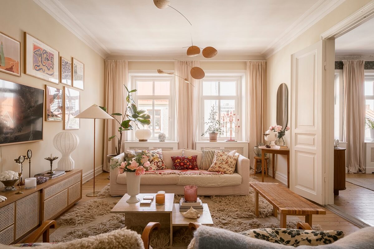 Hannes Mauritzson's Warm Yellow Hygge Apartment in Sweden 2 light cozy living room light yellow walls