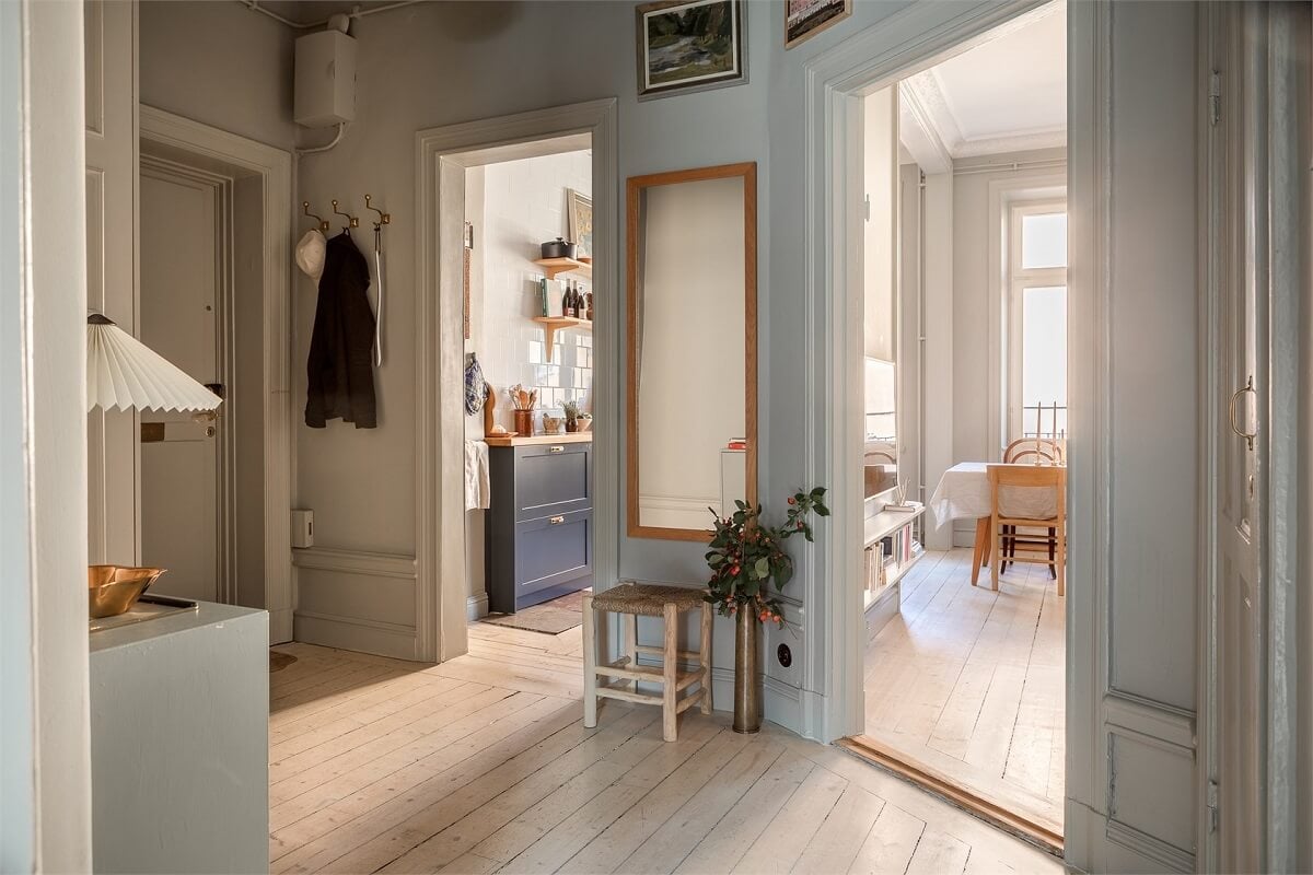 A Turn-of-the-Century Apartment with a Dark Blue Bedroom - Revisited 24 light gray hallway