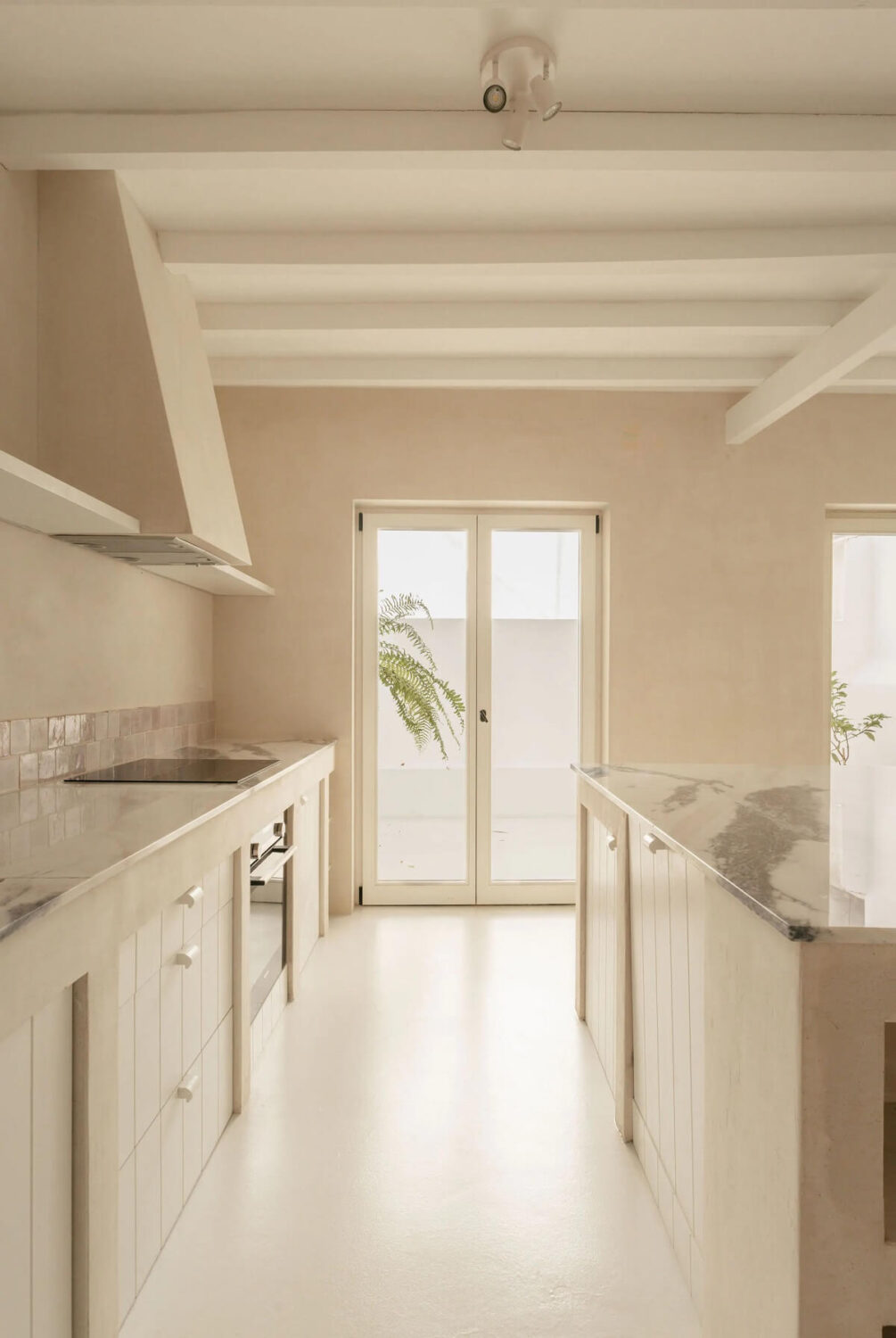 A Serene Minimalistic Townhouse in Portugal 8 light kitchen