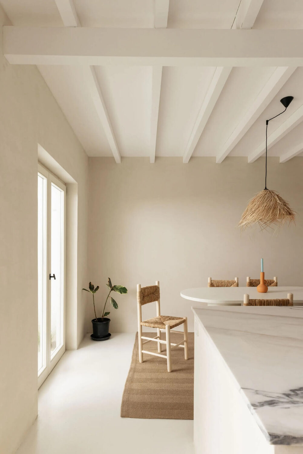 A Serene Minimalistic Townhouse in Portugal 9 light kitchen dining table
