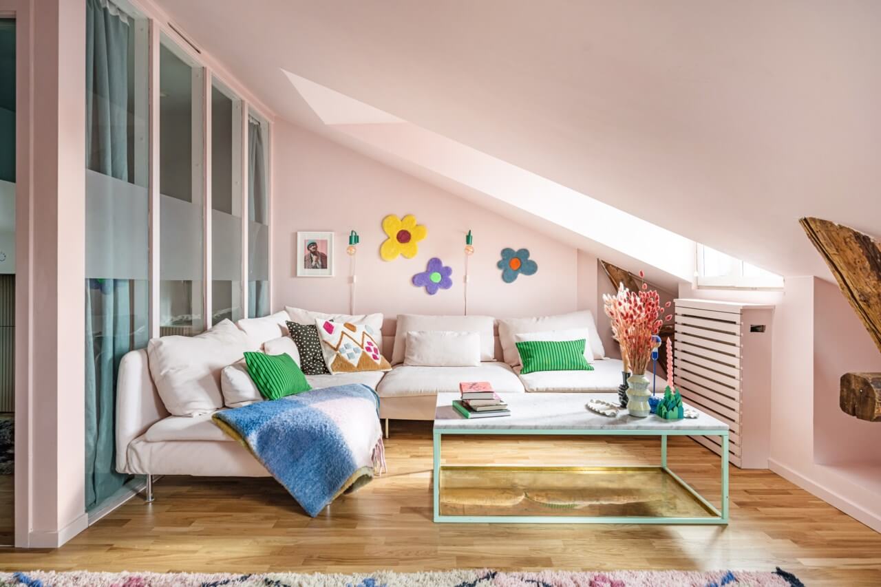 A Small, Colorful Attic Apartment with A Yellow Kitchen 2 light pink living room with slanted ceiling
