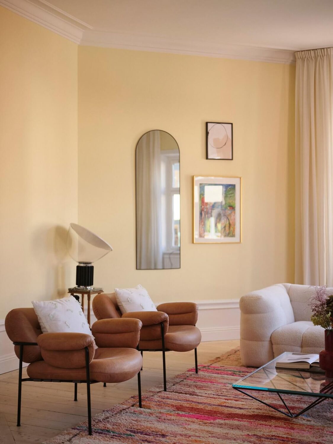 A Light Pastel Yellow and Pink Apartment in Stockholm 4 living room light yellow walls