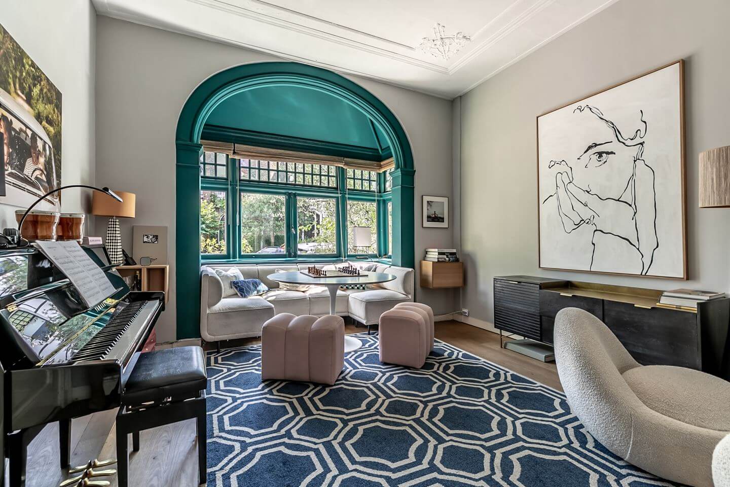 A Beautiful Monumental Villa with Green Color Accents 2 living room with teal green bay window