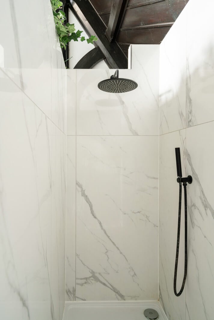 A Colorful Gothic-Style School Conversion in England 13 marble shower