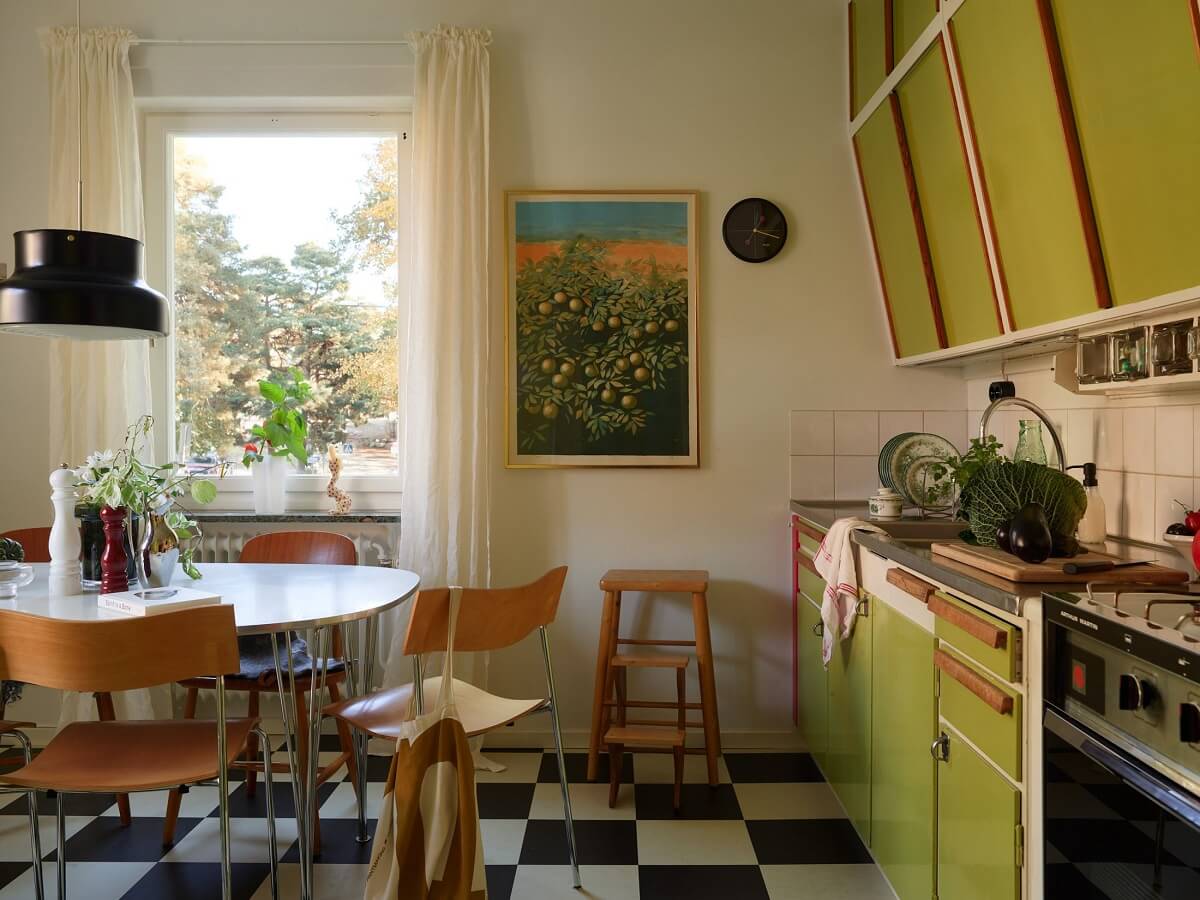 A Two-Bedroom Apartment with the Original Midcentury Kitchen 27 midcentury kitchen with green cabinets and checkerboard floor