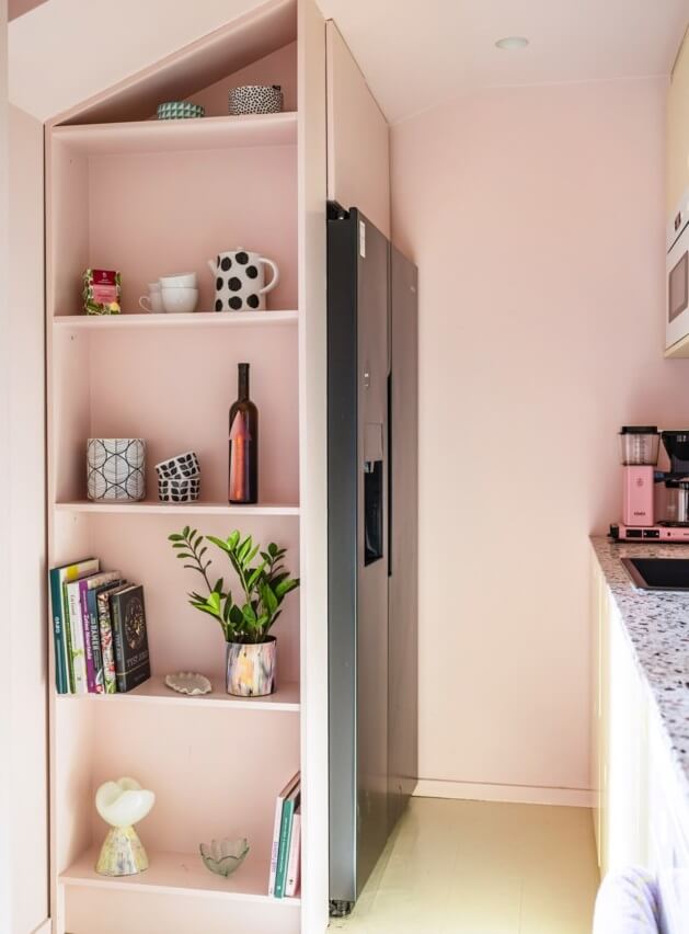 A Small, Colorful Attic Apartment with A Yellow Kitchen 11 open kitchen storage