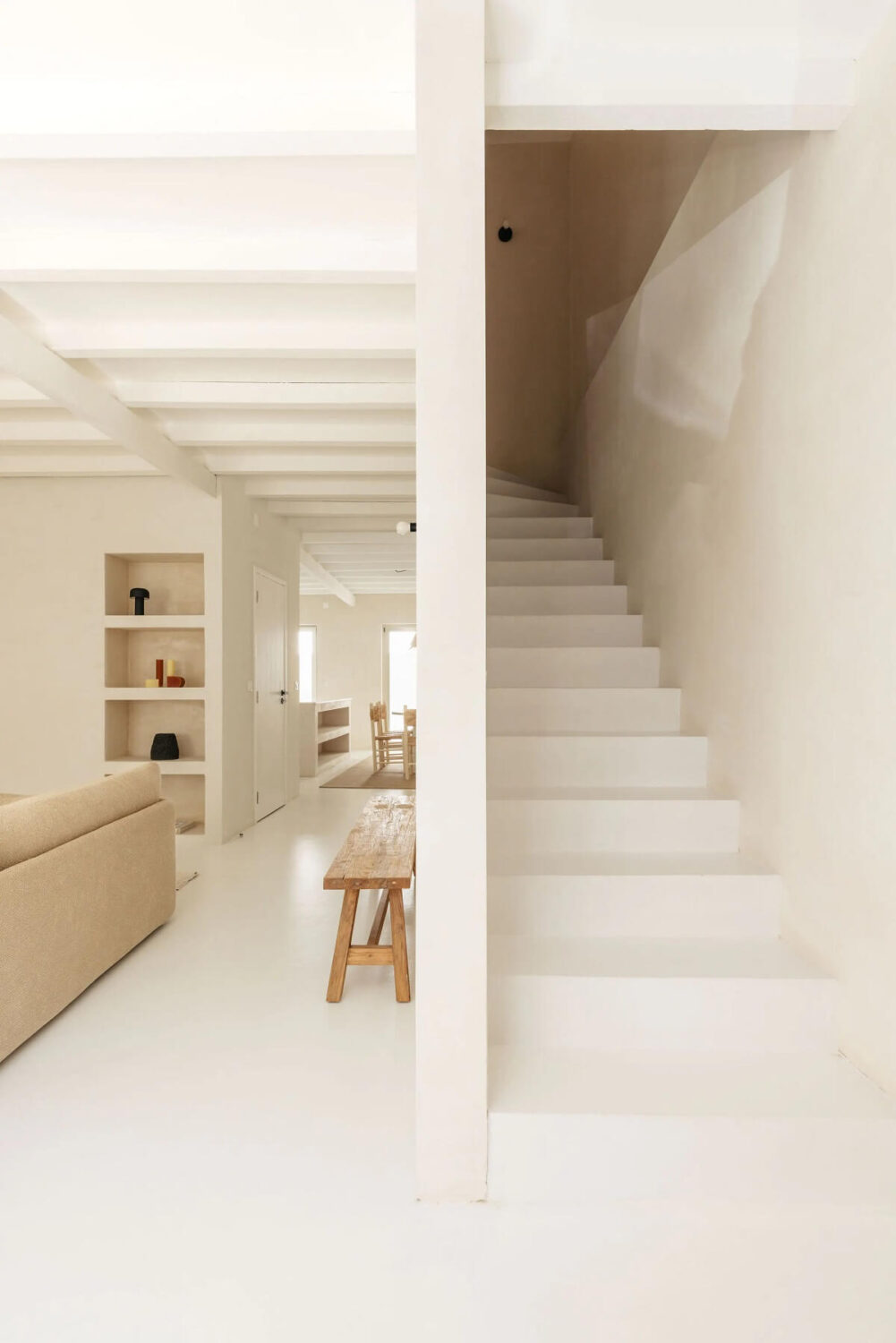 A Serene Minimalistic Townhouse in Portugal 5 open living room staircase