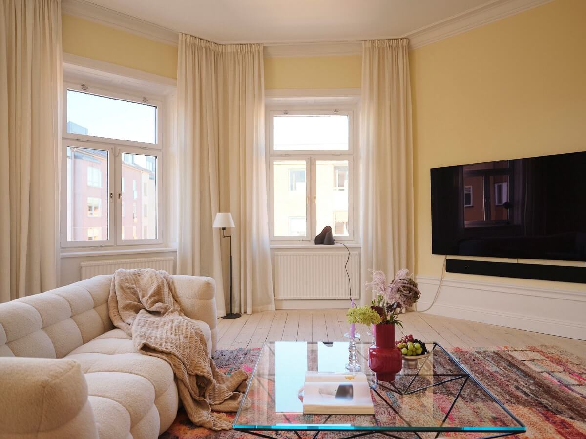 A Light Pastel Yellow and Pink Apartment in Stockholm 8 pastel yellow sitting room