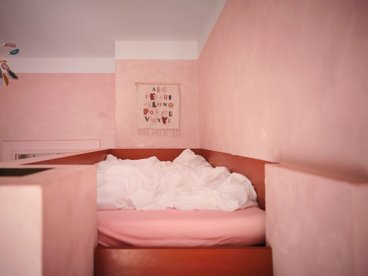 A Light Pastel Yellow and Pink Apartment in Stockholm 24 pink loft bed