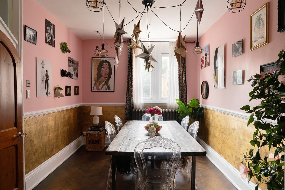 A Colorful Gothic-Style School Conversion in England 2 pink walls with art dining room