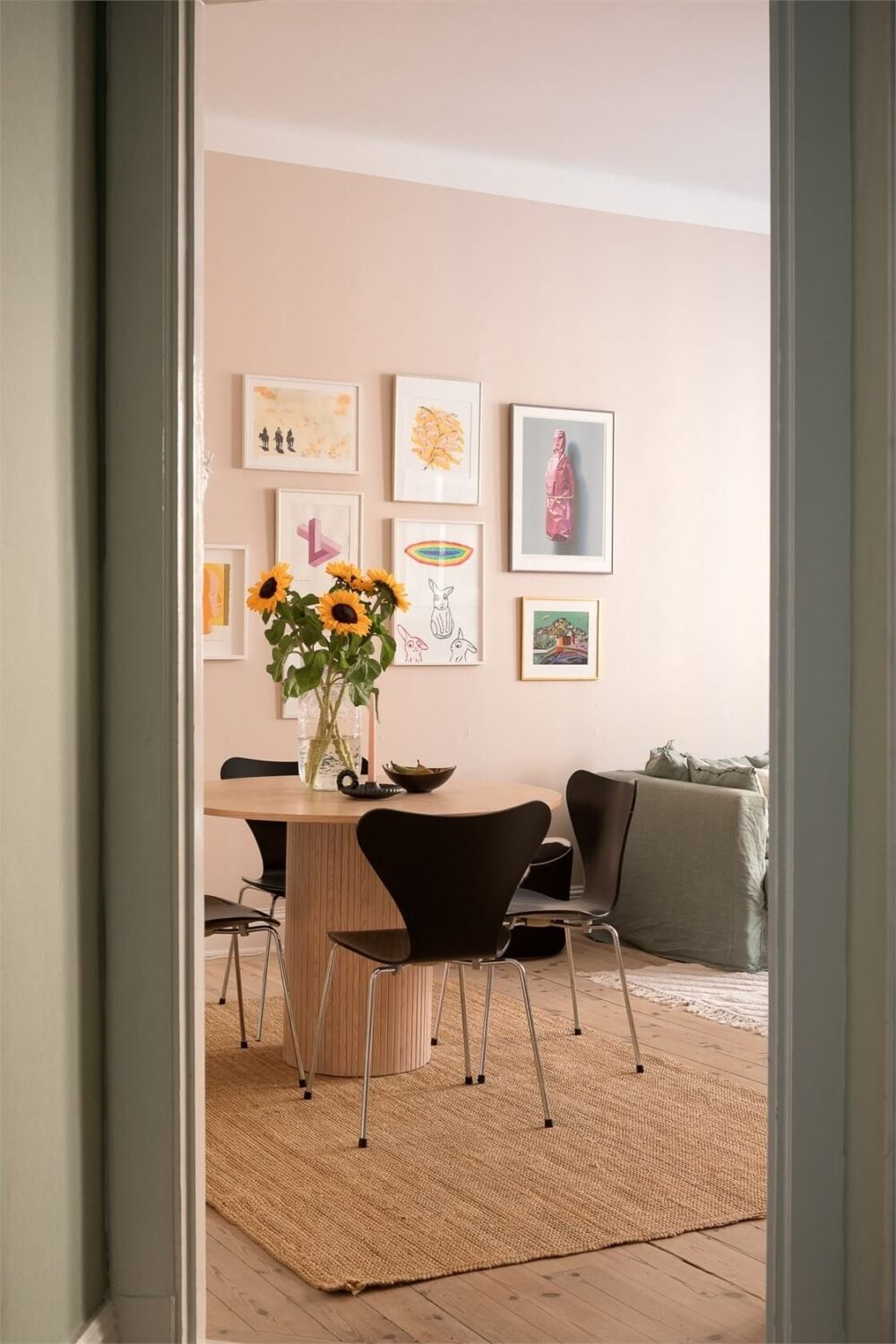 Nature-Inspired Colors in a Charming Stockholm Apartment 9 round dining table jute rug