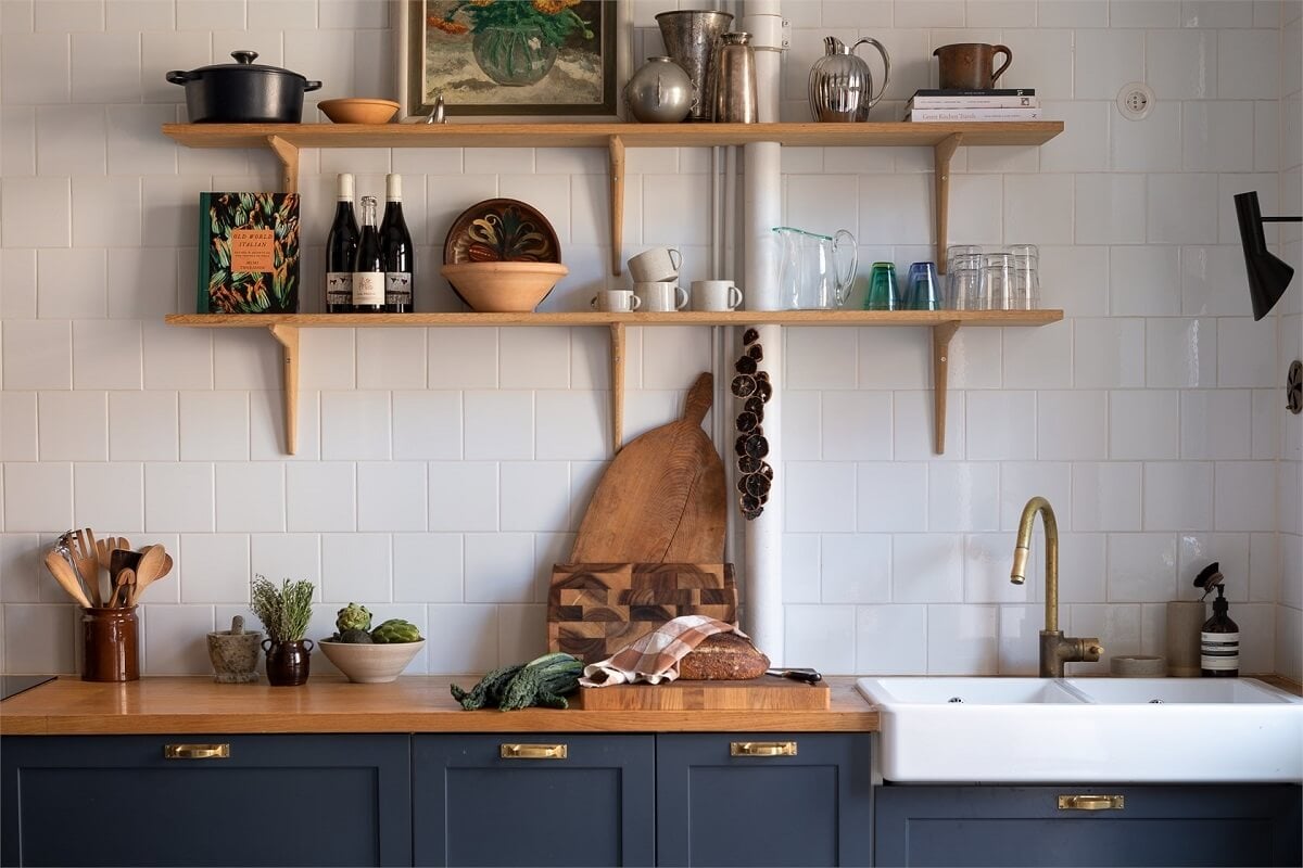 A Turn-of-the-Century Apartment with a Dark Blue Bedroom - Revisited 14 rustic blue kitchen shelves