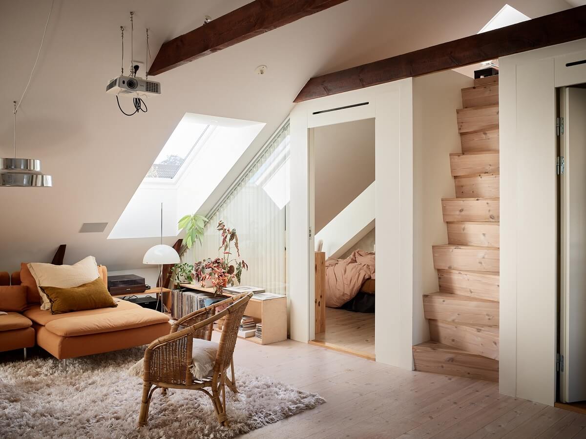 A Light Two-Bedroom Attic Apartment in Sweden 10 scandi attic living room