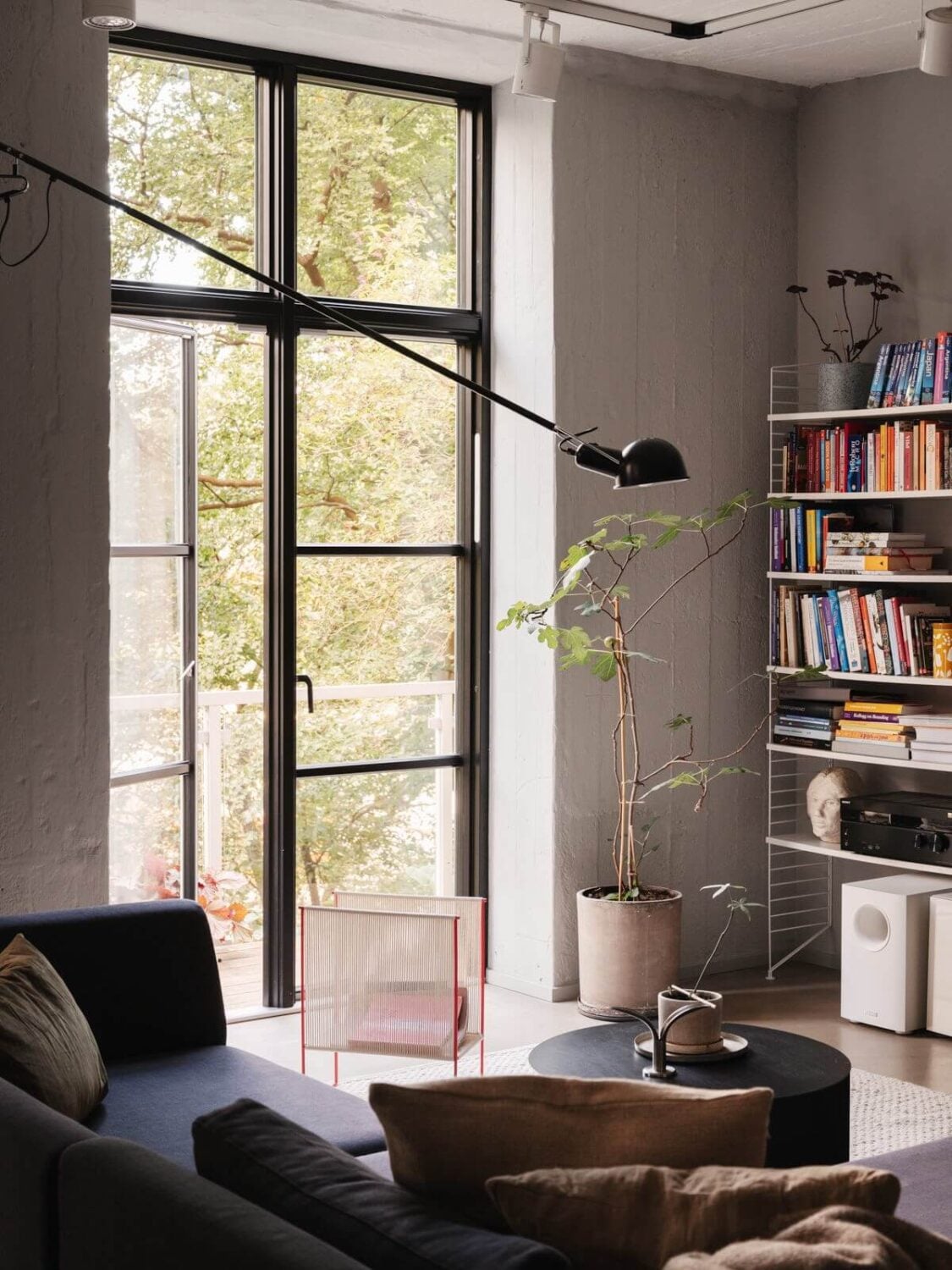 A Modern Industrial Basement Apartment in Sweden 7 scandi living room detail