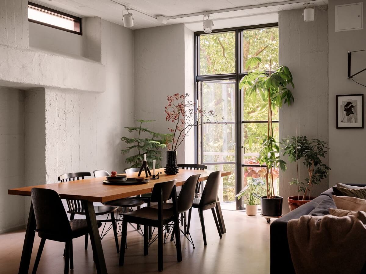 A Modern Industrial Basement Apartment in Sweden 10 scandi living room large table
