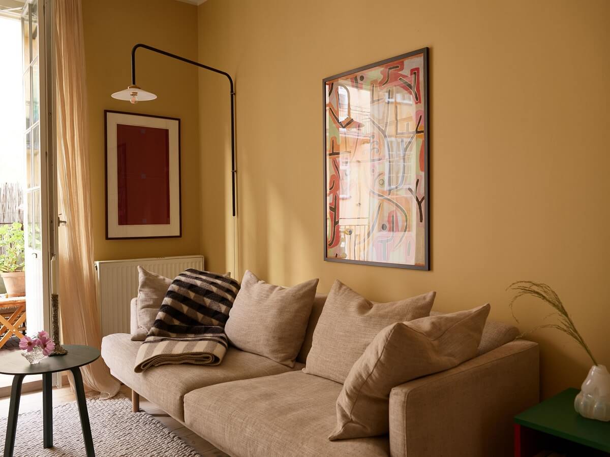 Golden Yellow Walls in a Colorful Swedish Studio Apartment 2 scandi studio apartment golden yellow walls