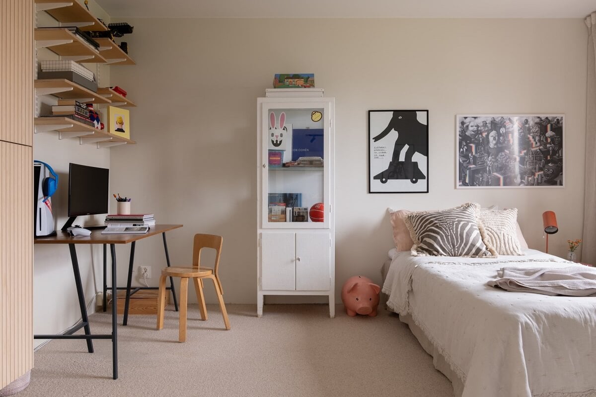 A Light and Modern Stockholm Apartment with Cheerful Color Accents 14 scandinavian bedroom with desk