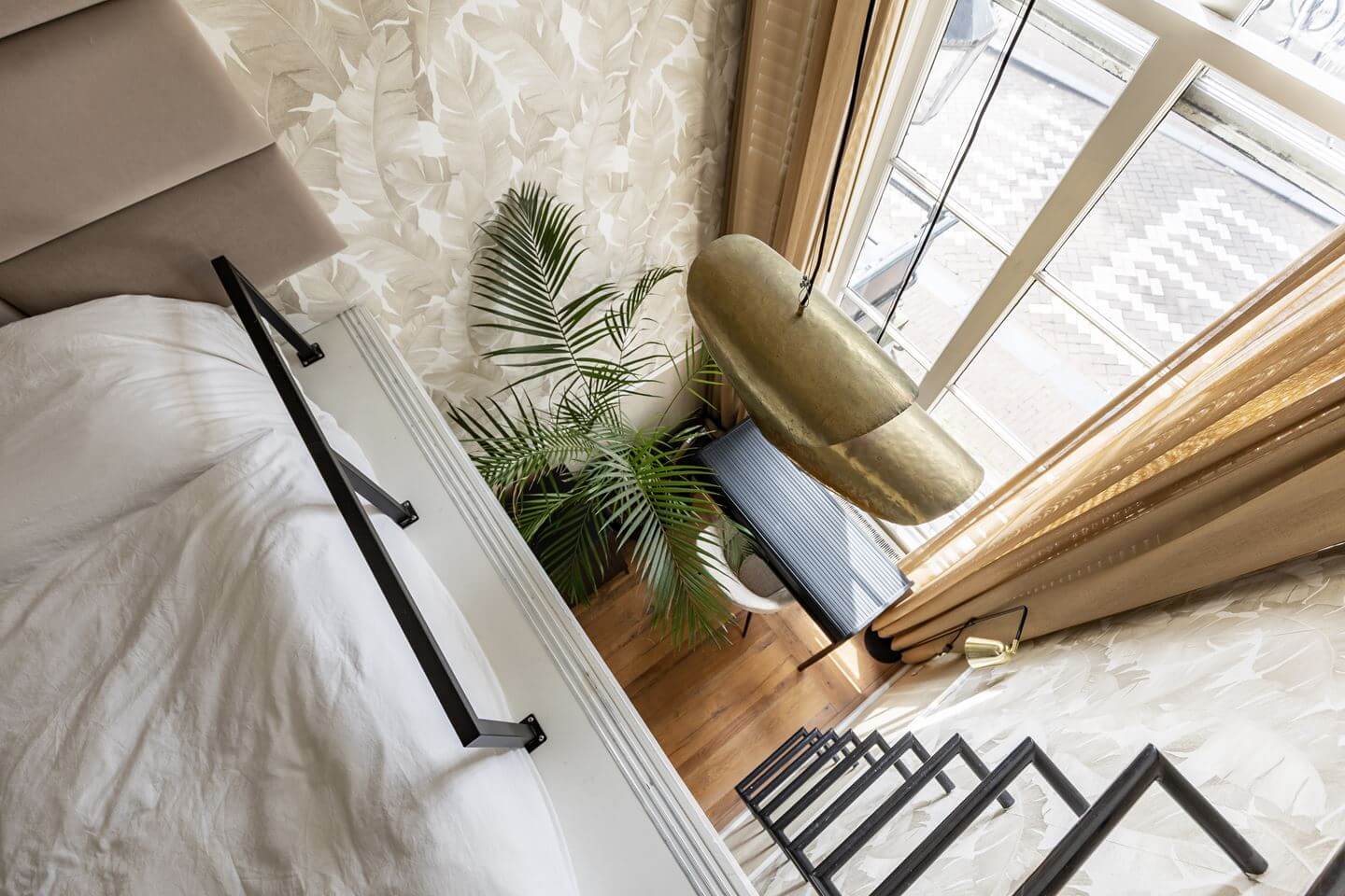 Hotel-Style Interiors in an Amsterdam Canal House 13 small bedroom loft bed high ceilings