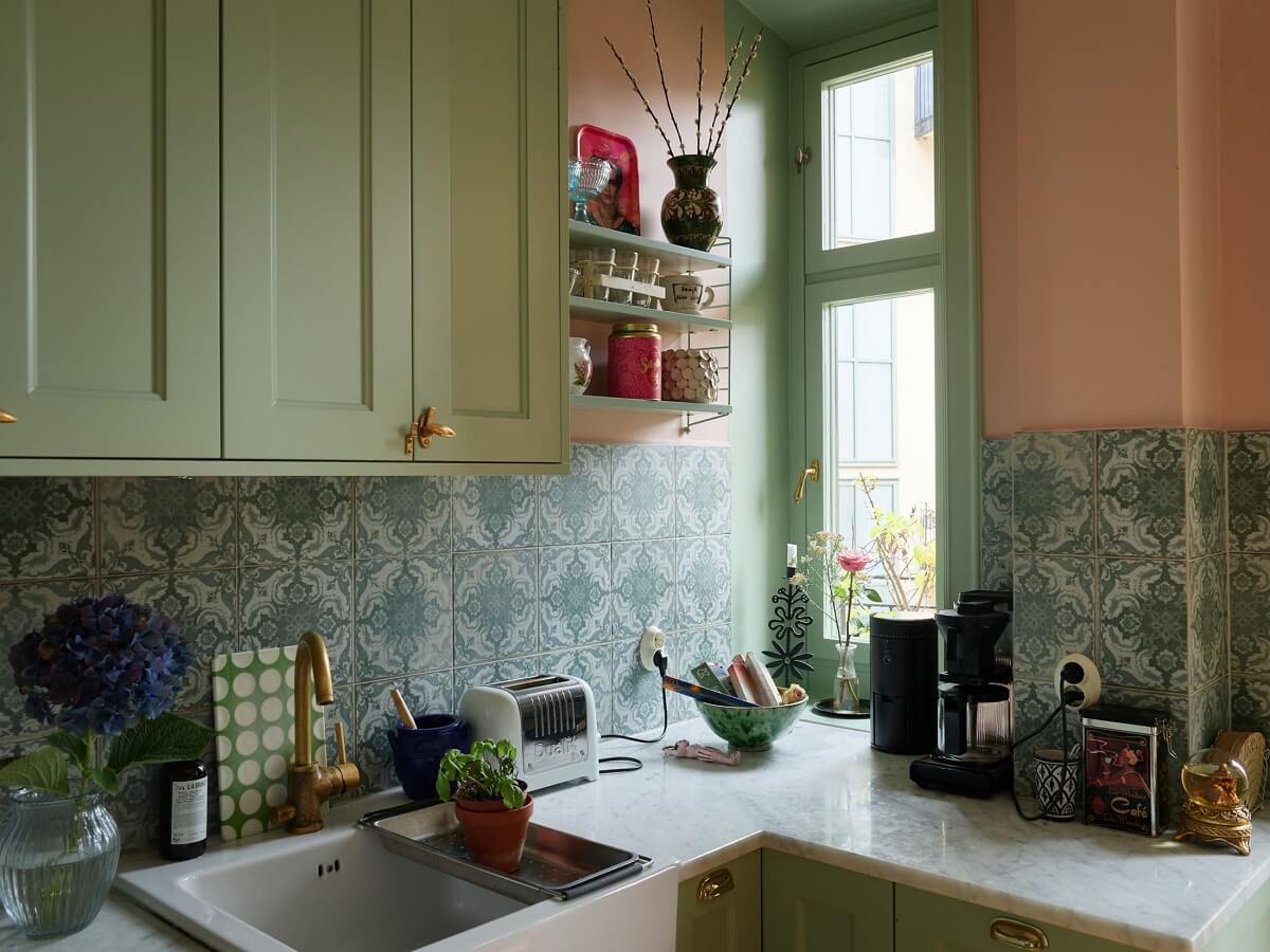 Small Space, Big Style: How to Design a Teeny-Tiny Kitchen That Works 29 small kitchen window light green cabinets