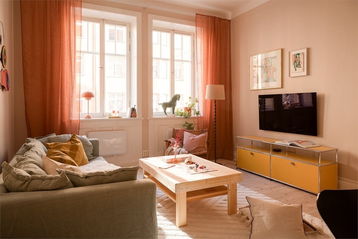 Nature-Inspired Colors in a Charming Stockholm Apartment 5 soft light scandinavian living room